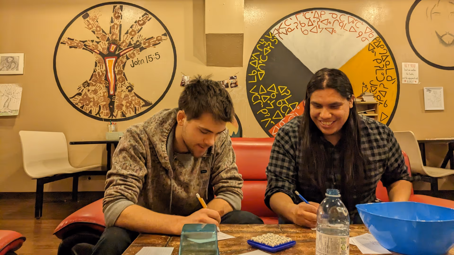A teacher stands in front of a class
