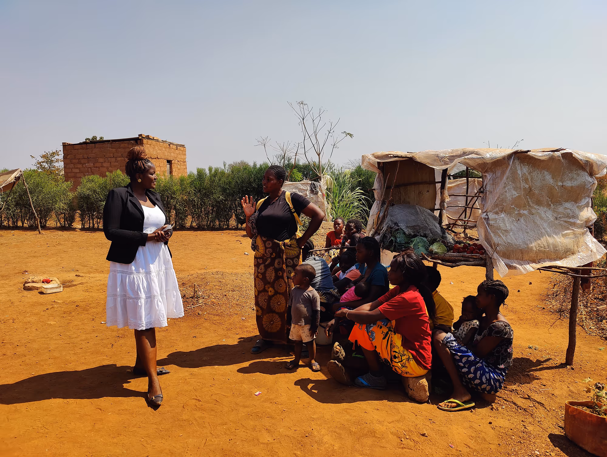 A teacher stands in front of a class