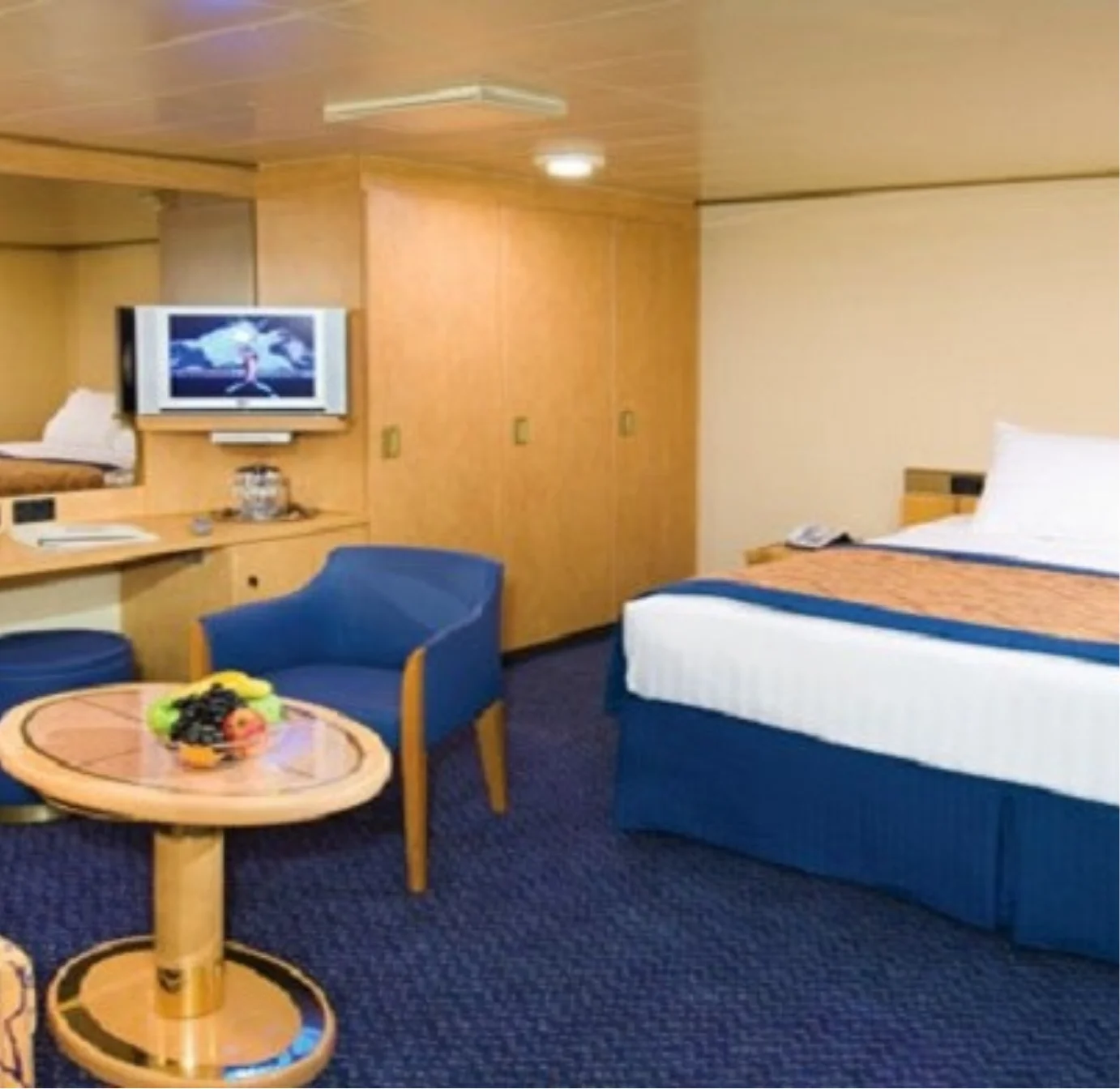 Accessible Stateroom with queen bed and lounge area