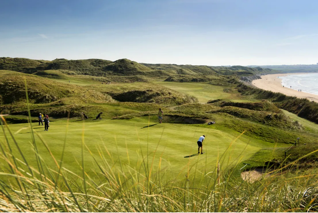 A golfer playing a links course in the southwest of Ireland