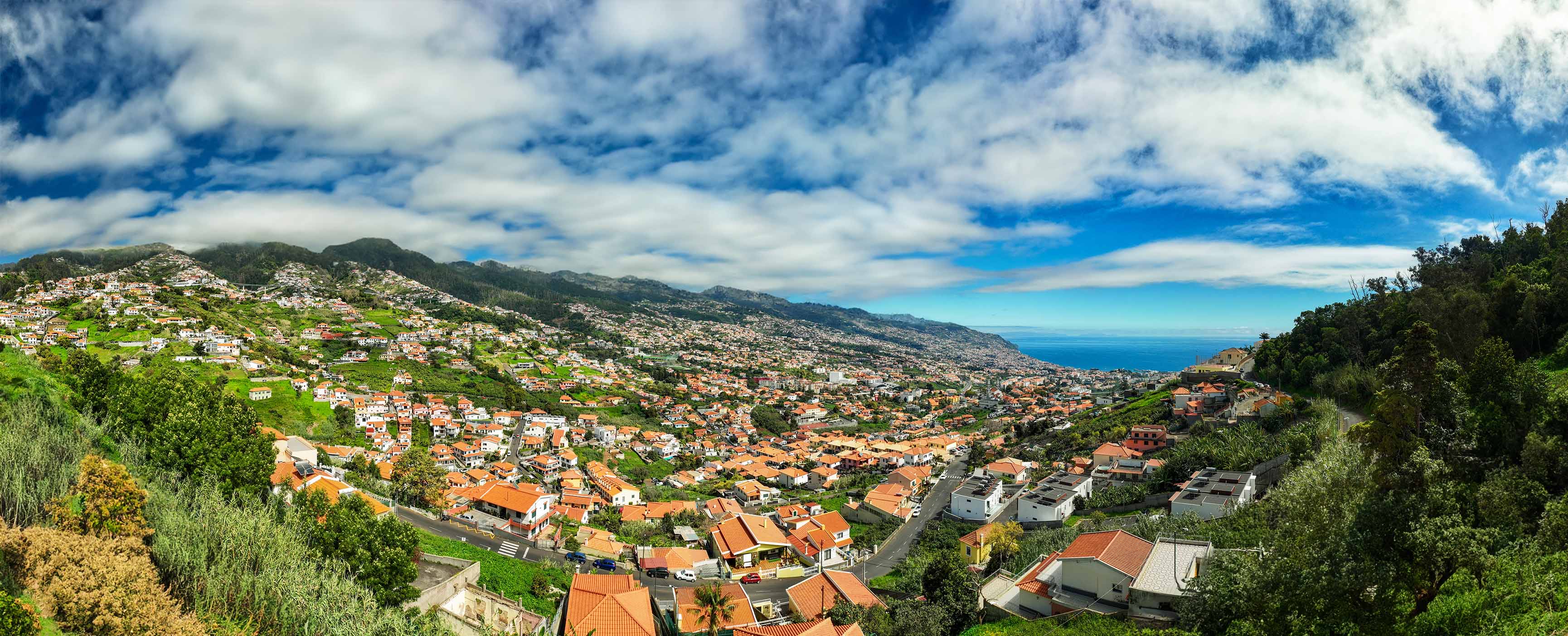 A view of the mountain and sea as you look out from Moravida plot