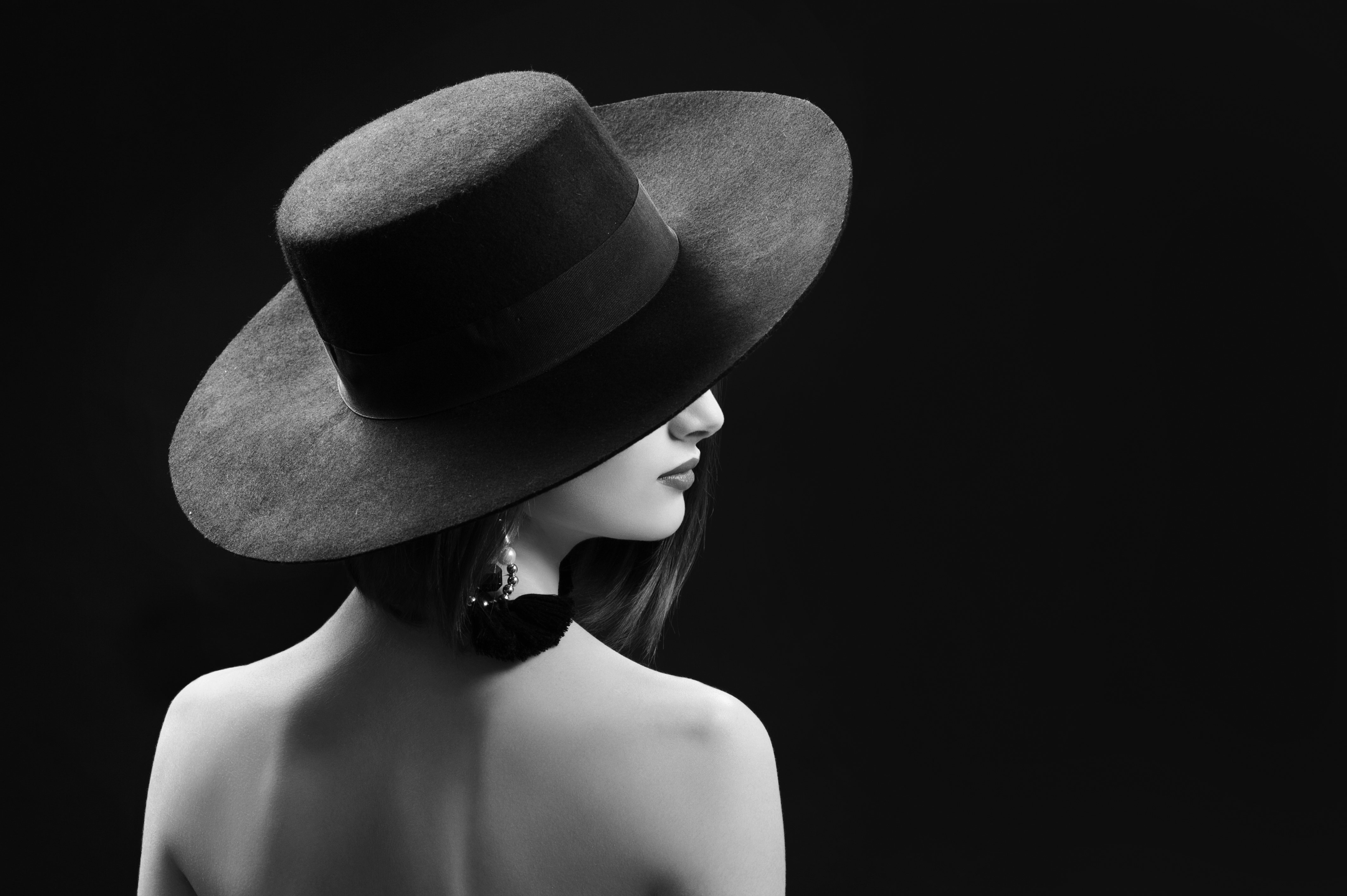 Random stylish woman in a black hat. Style points only. 