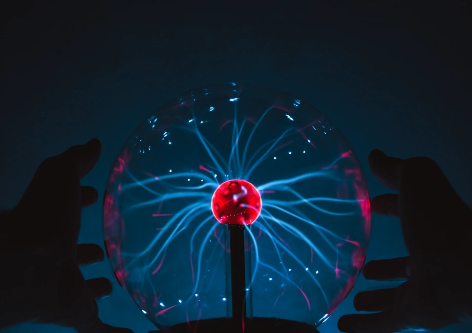 Static electricity shock to a hand touching a metal doorknob indoors