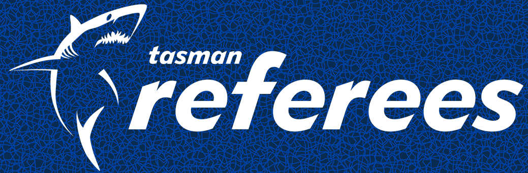 Tasman Referees logo with white shark graphic on blue net-like background.