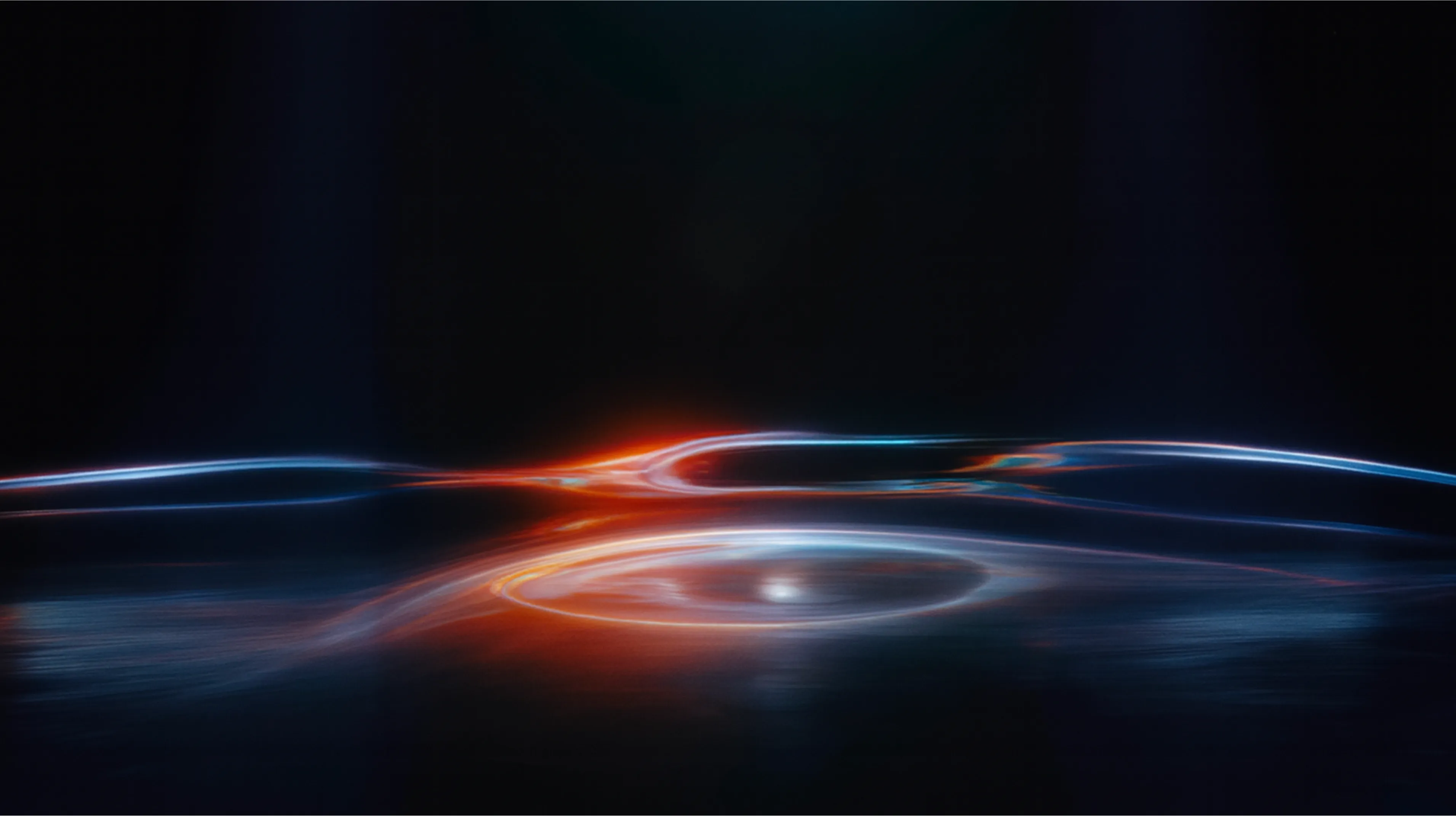 Abstract digital light waves in blue and orange hues reflected on a dark surface.