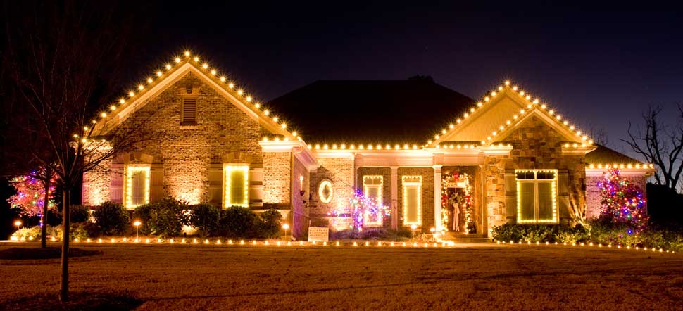 A house decorated with vibrant Christmas Lights.