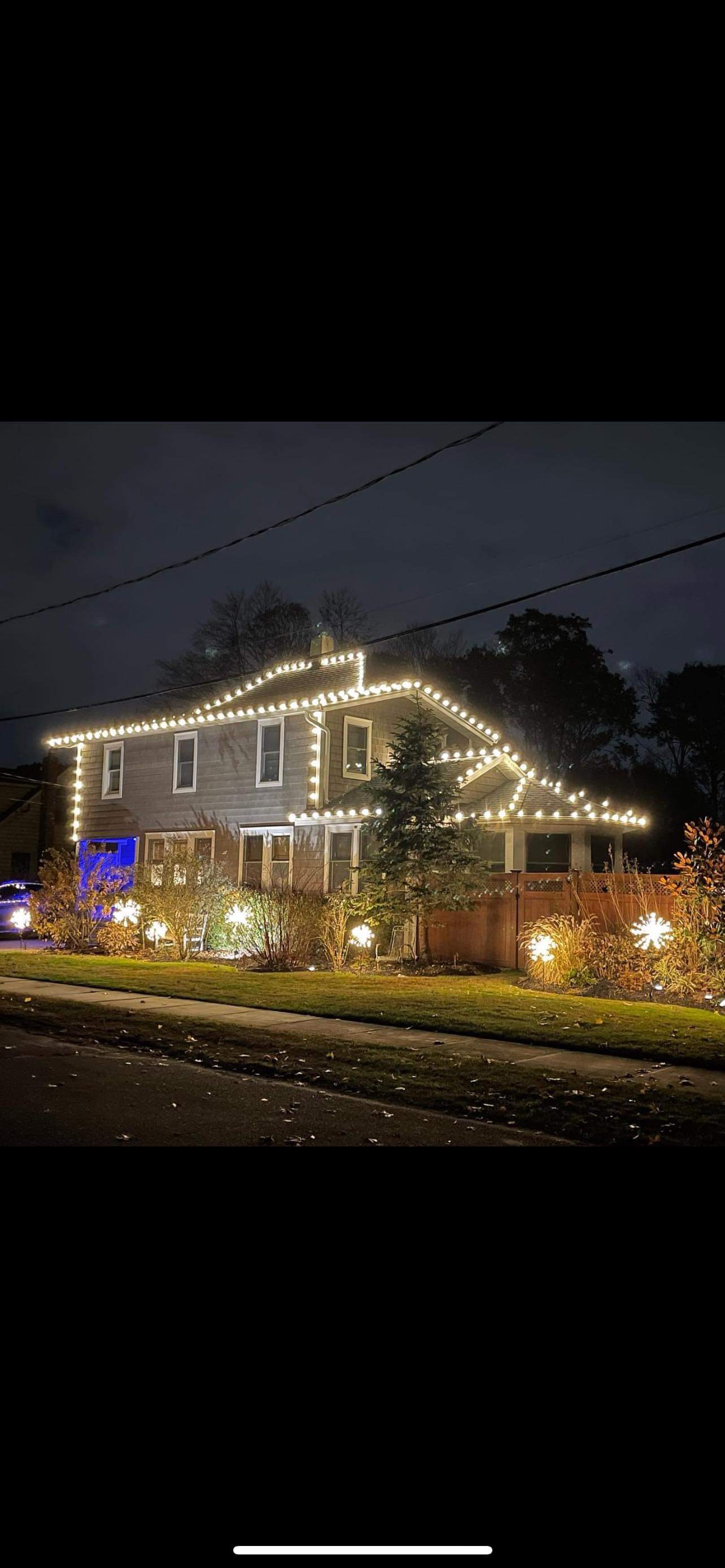 A house filled with Christmas lights.