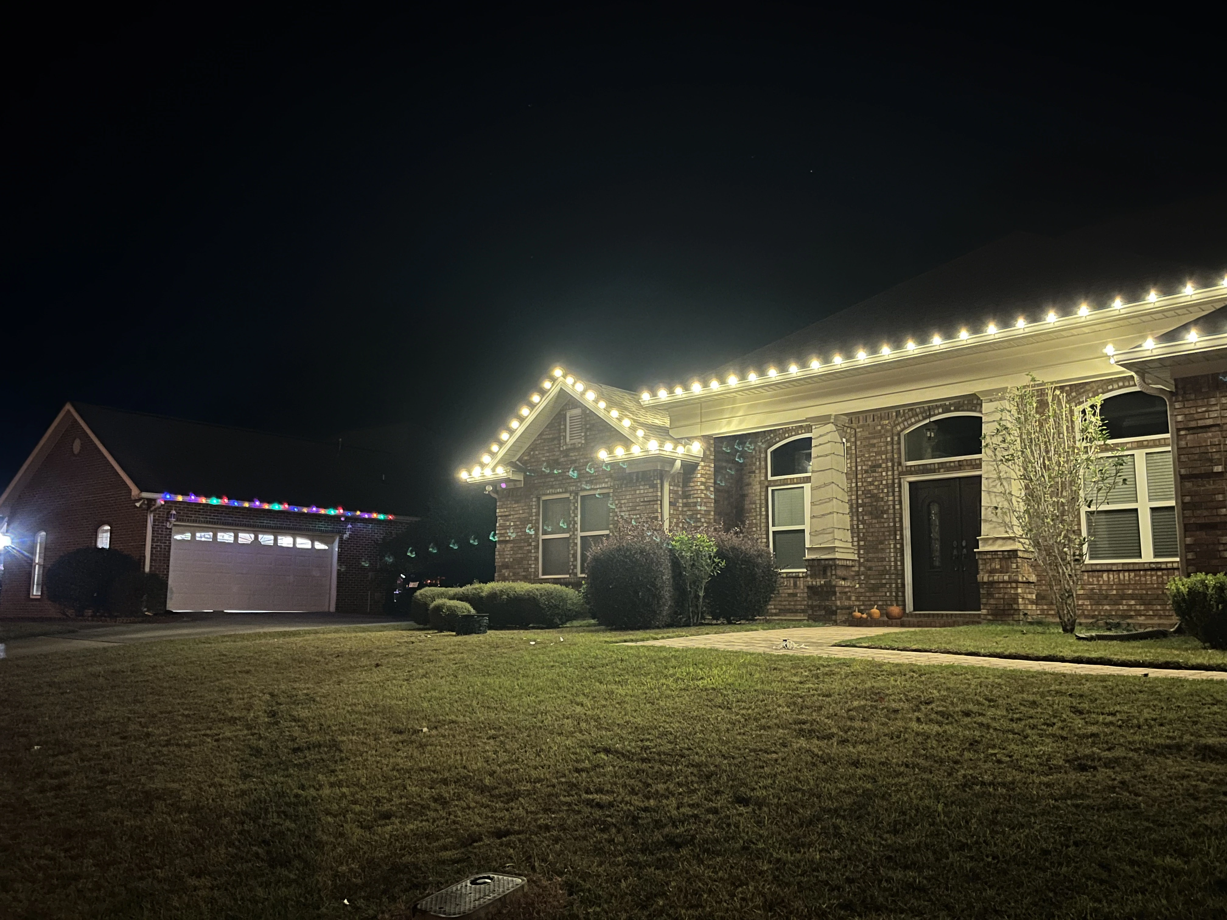 A house with white decorated lights.