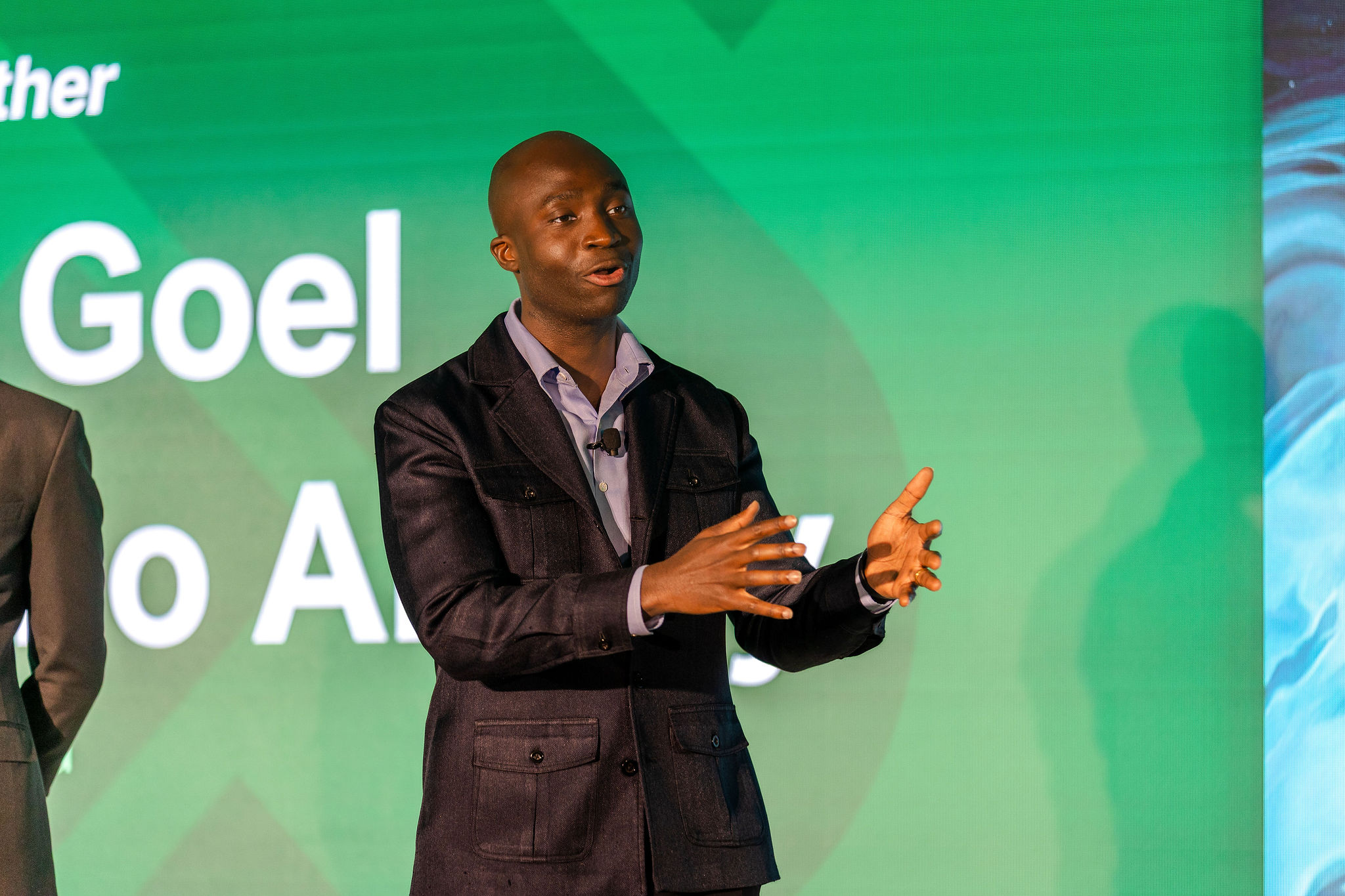 Abbey Wemimo, Co-founder of Esusu speaking at a conference