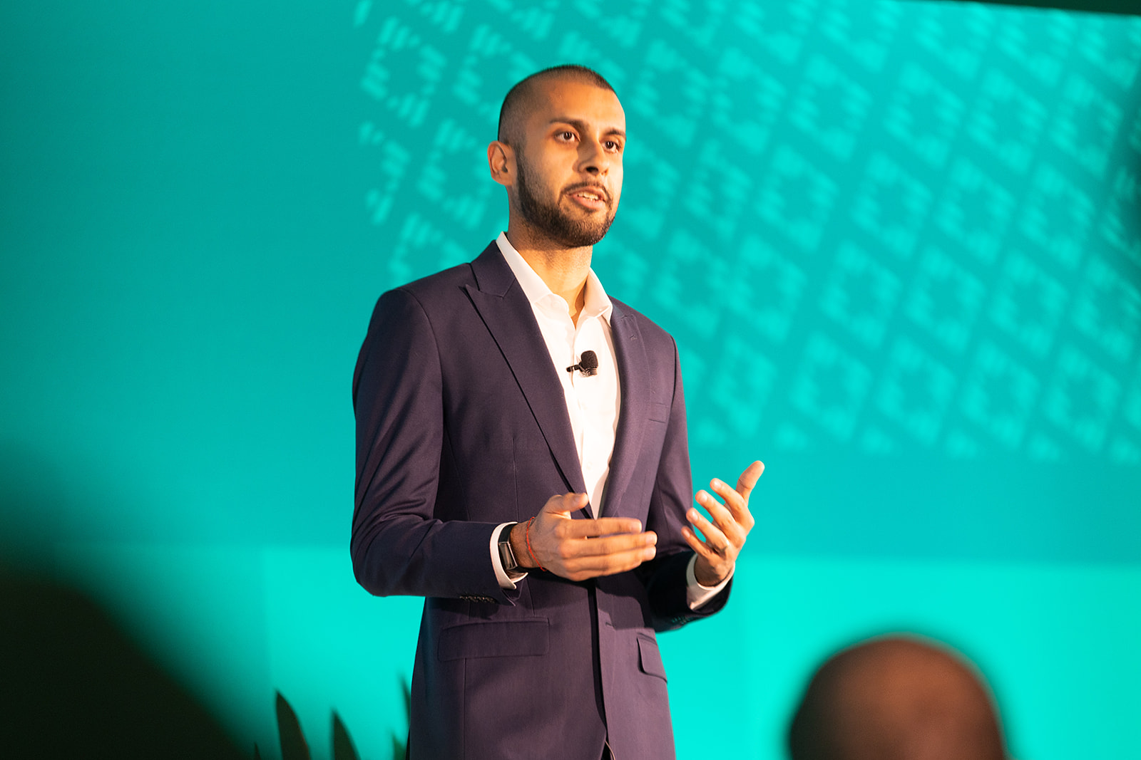 Samir Goel, Co-founder of Esusu speaking at a conference