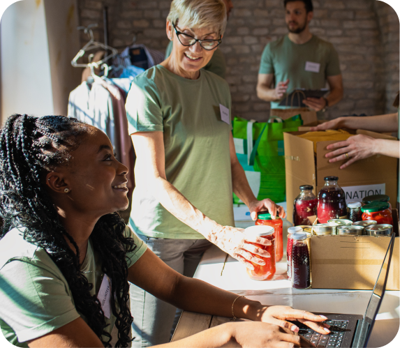 2 Women at a workshop smiling