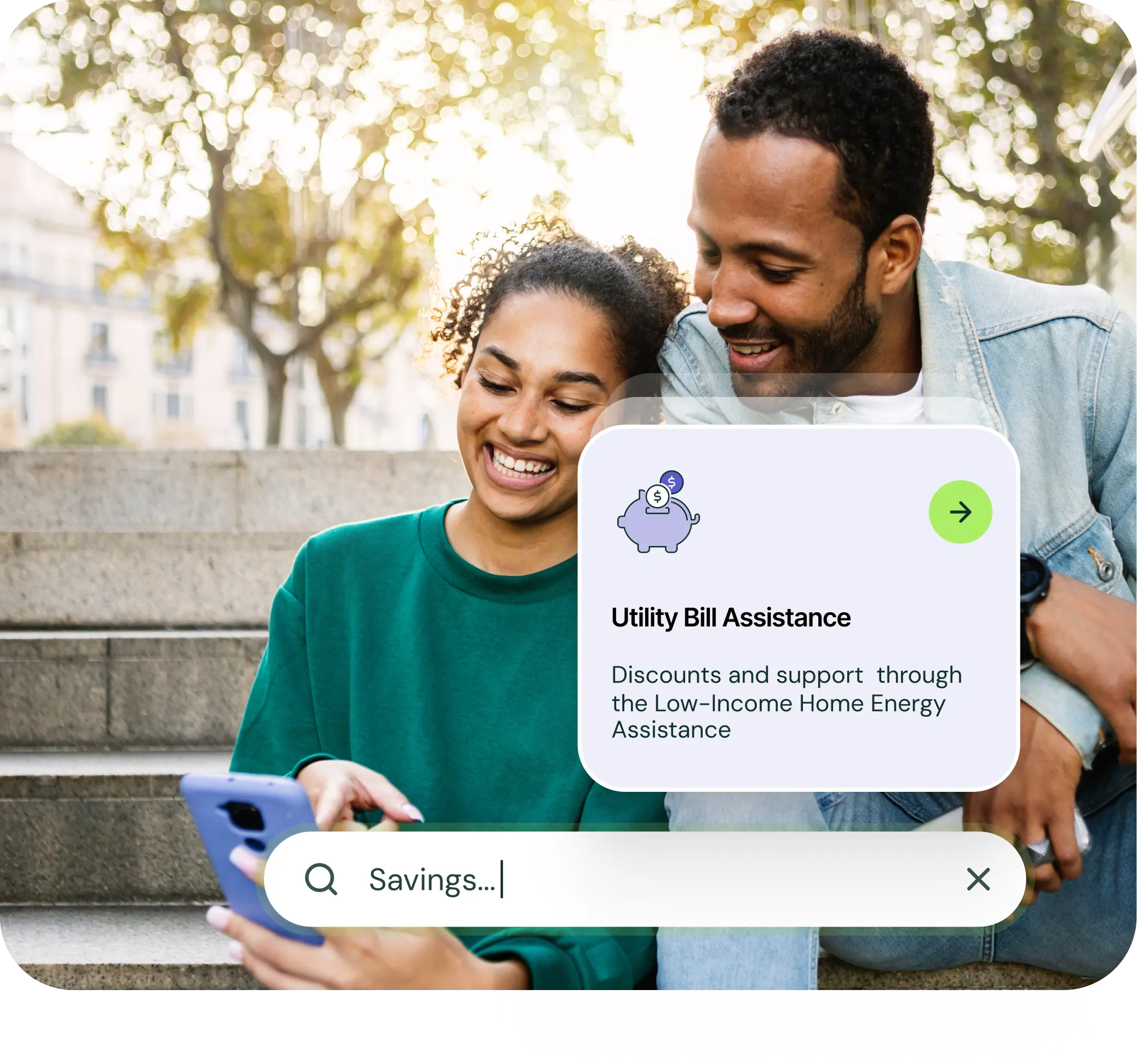 Smiling young woman and man sitting on outdoor steps looking at a phone with an overlay about utility bill assistance for low-income home energy support.