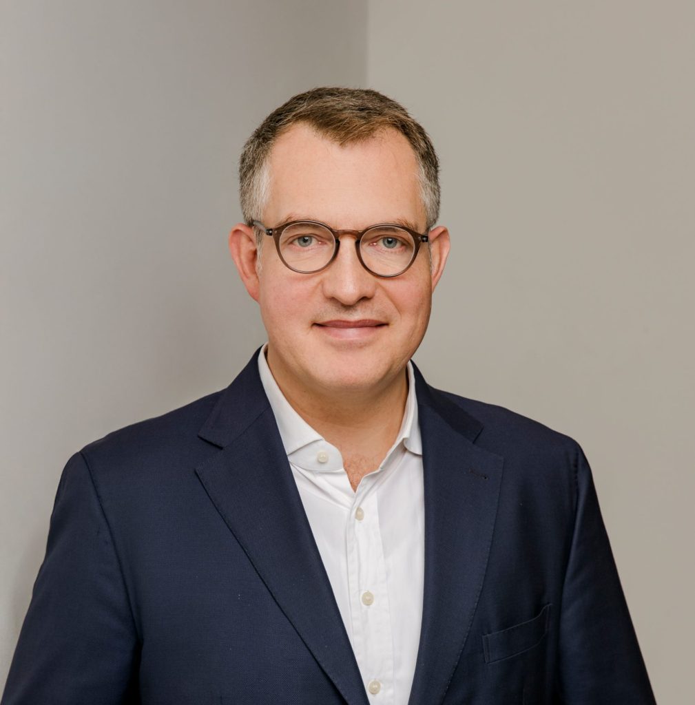 [background image] image of collaborative meeting (for a game development company)