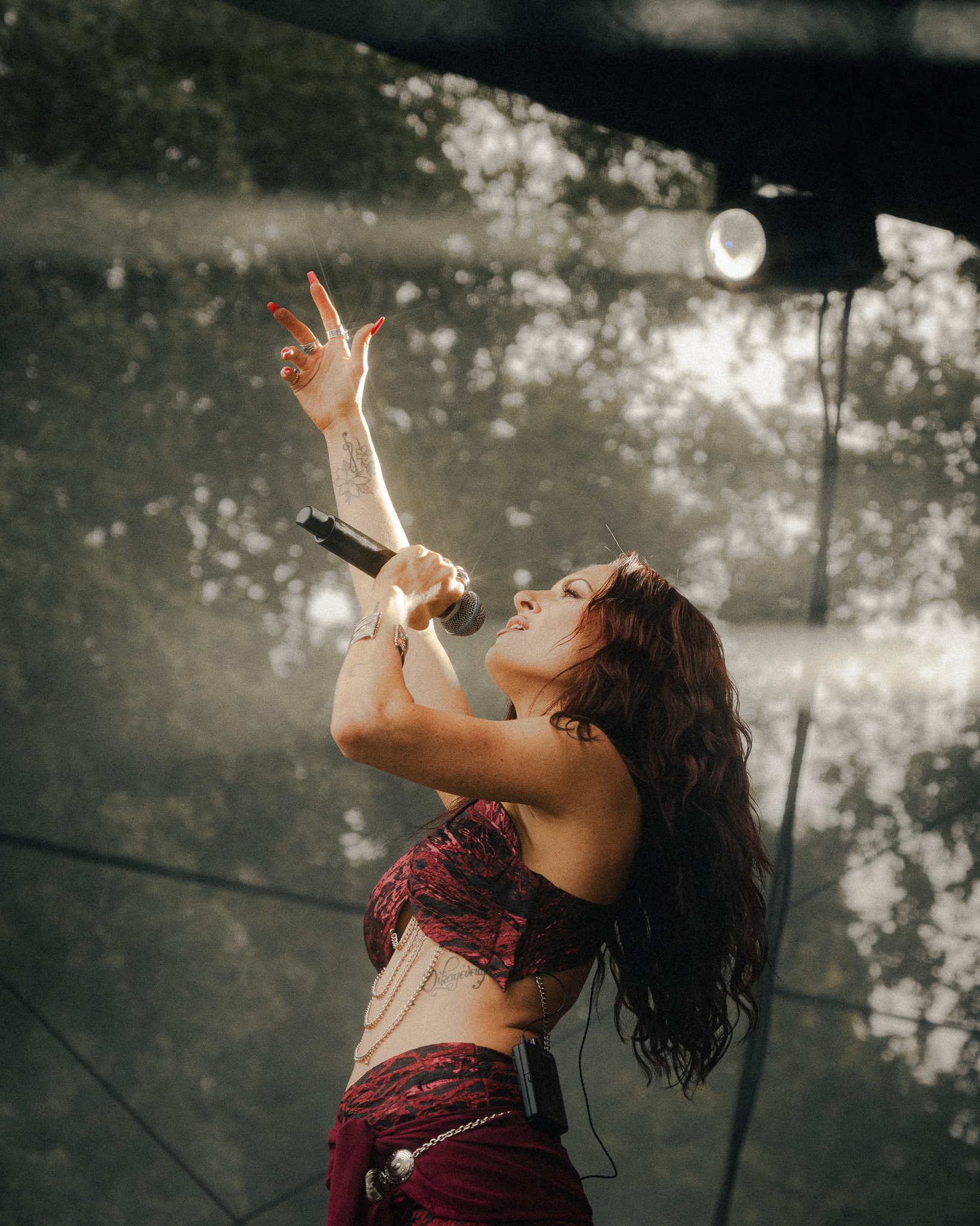 Picture of a singer giving her all for a song