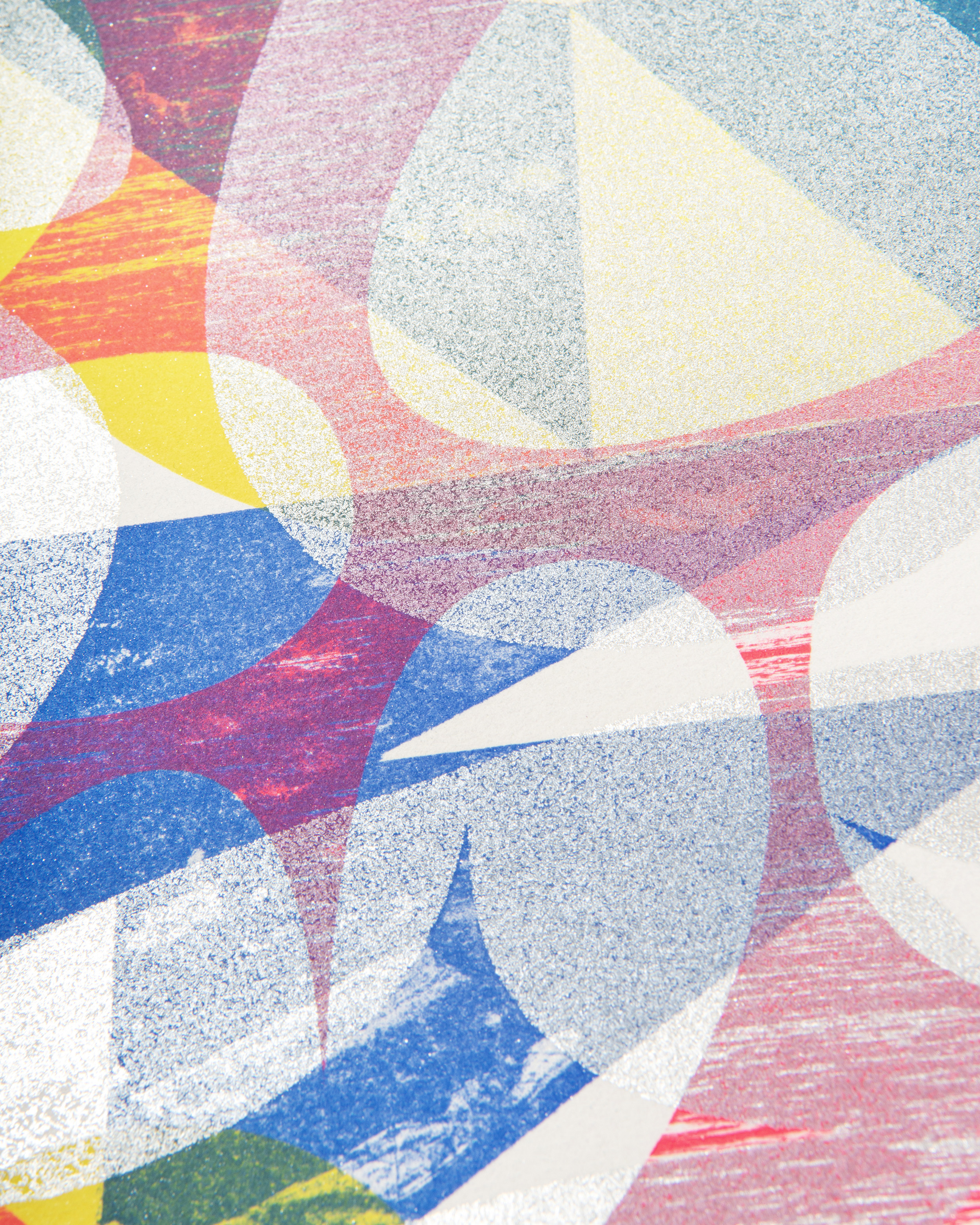 Detail of a lithography card printed in pink, silver, blue and yellow.