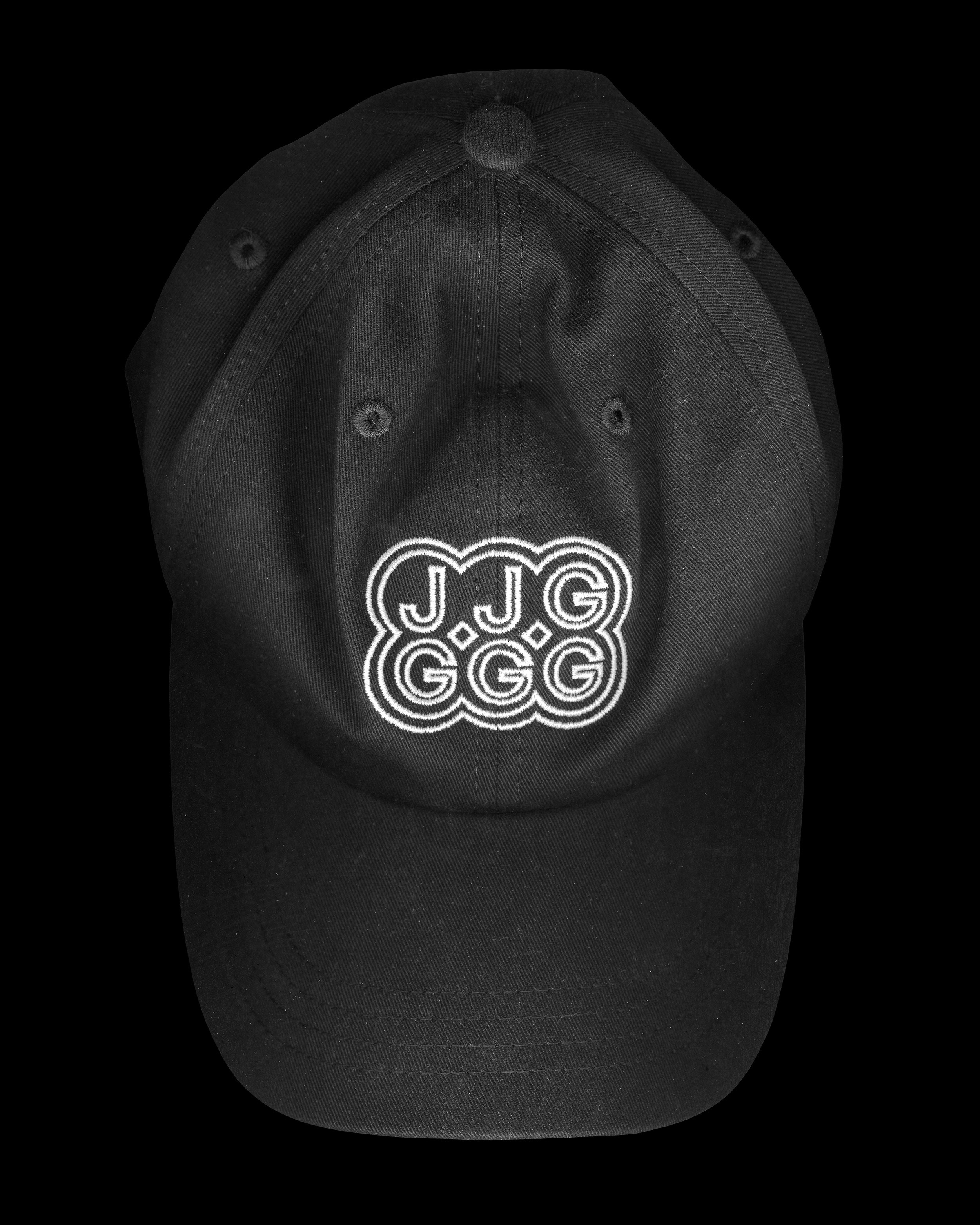 Black baseball cap with white embroidered logo featuring the letters J.J.G and G.G.G.