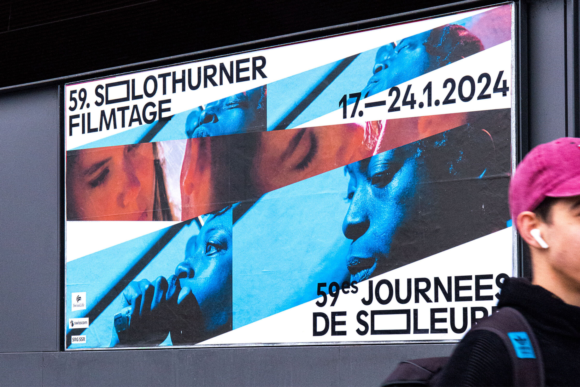 Poster for the 59th Solothurn Film Festival held from January 17 to 24, 2024, featuring blue-toned close-ups of faces and hands.