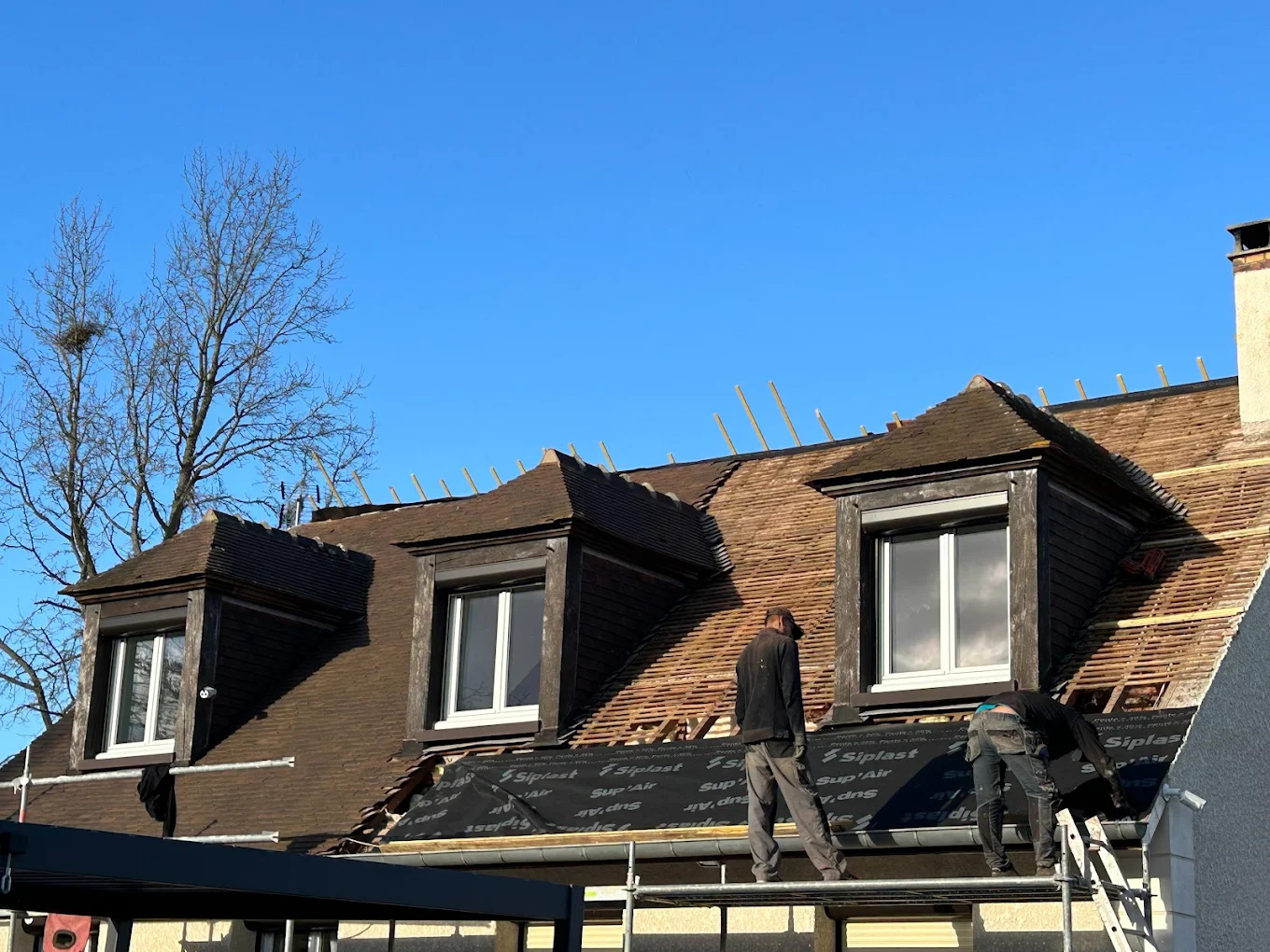 image of roof being repaired