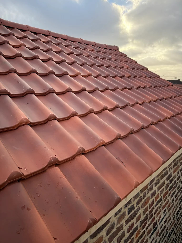 image of roofing contractor at work