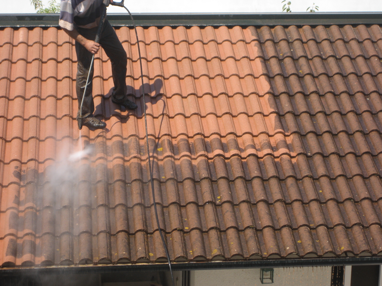 image of roofing contractor at work