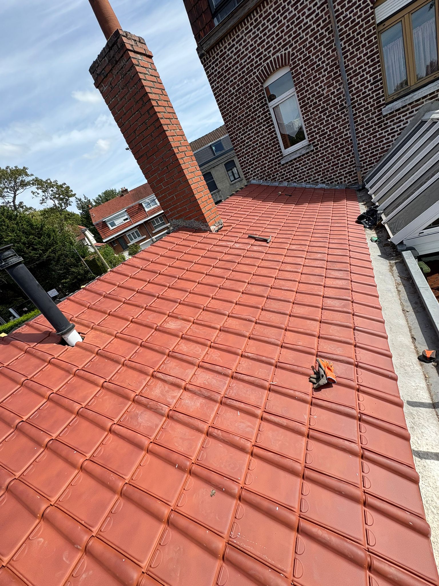 image of roofing contractor at work