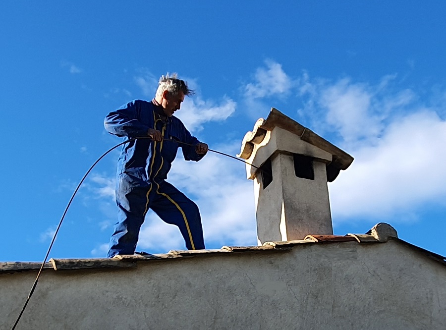 image of contractor on rooftop