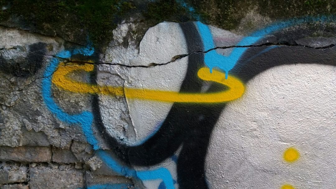 Graffiti and einer Wand.