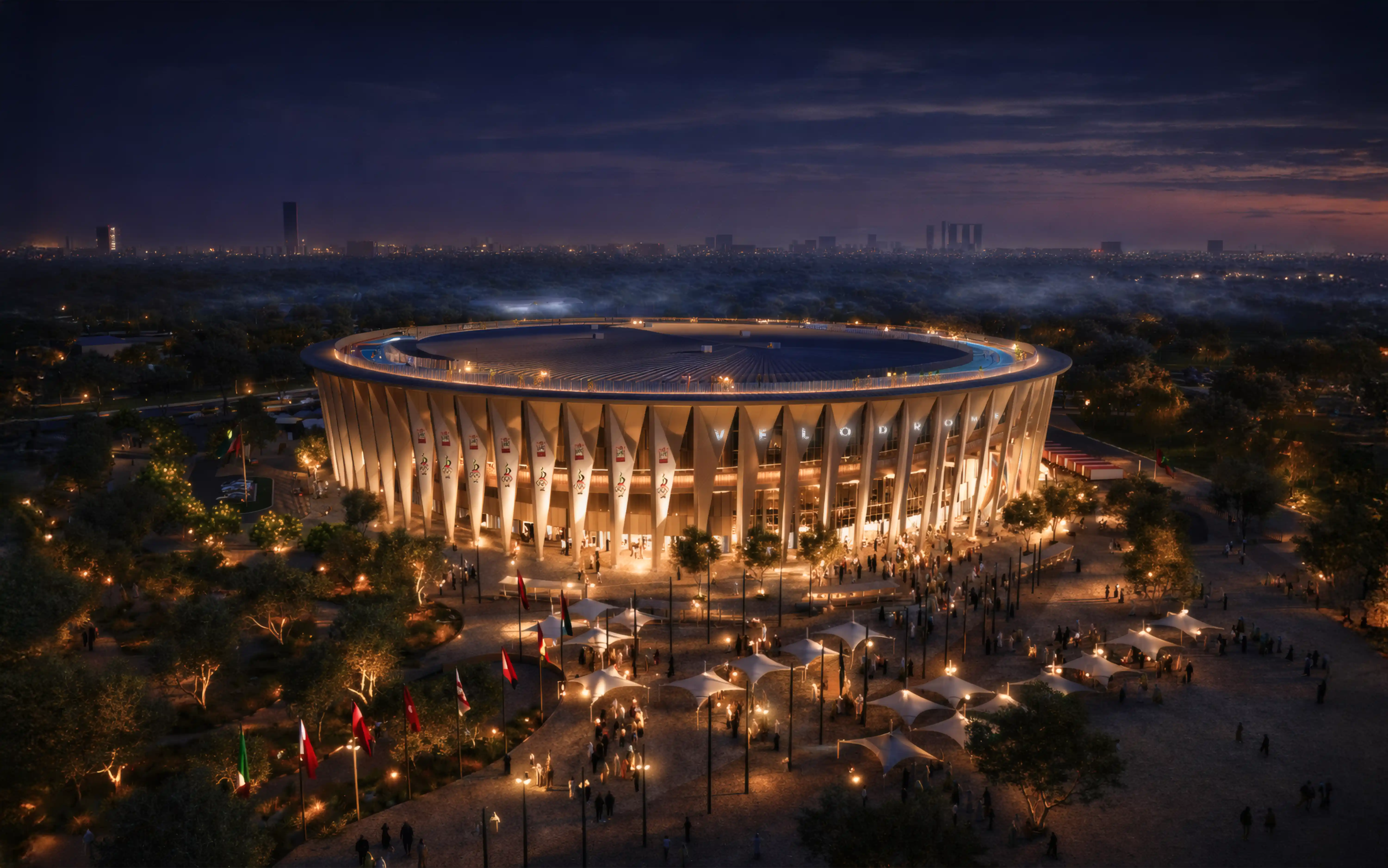Nighttime aerial view of the Velodrome sports arena, with the main identification done by LIMAH