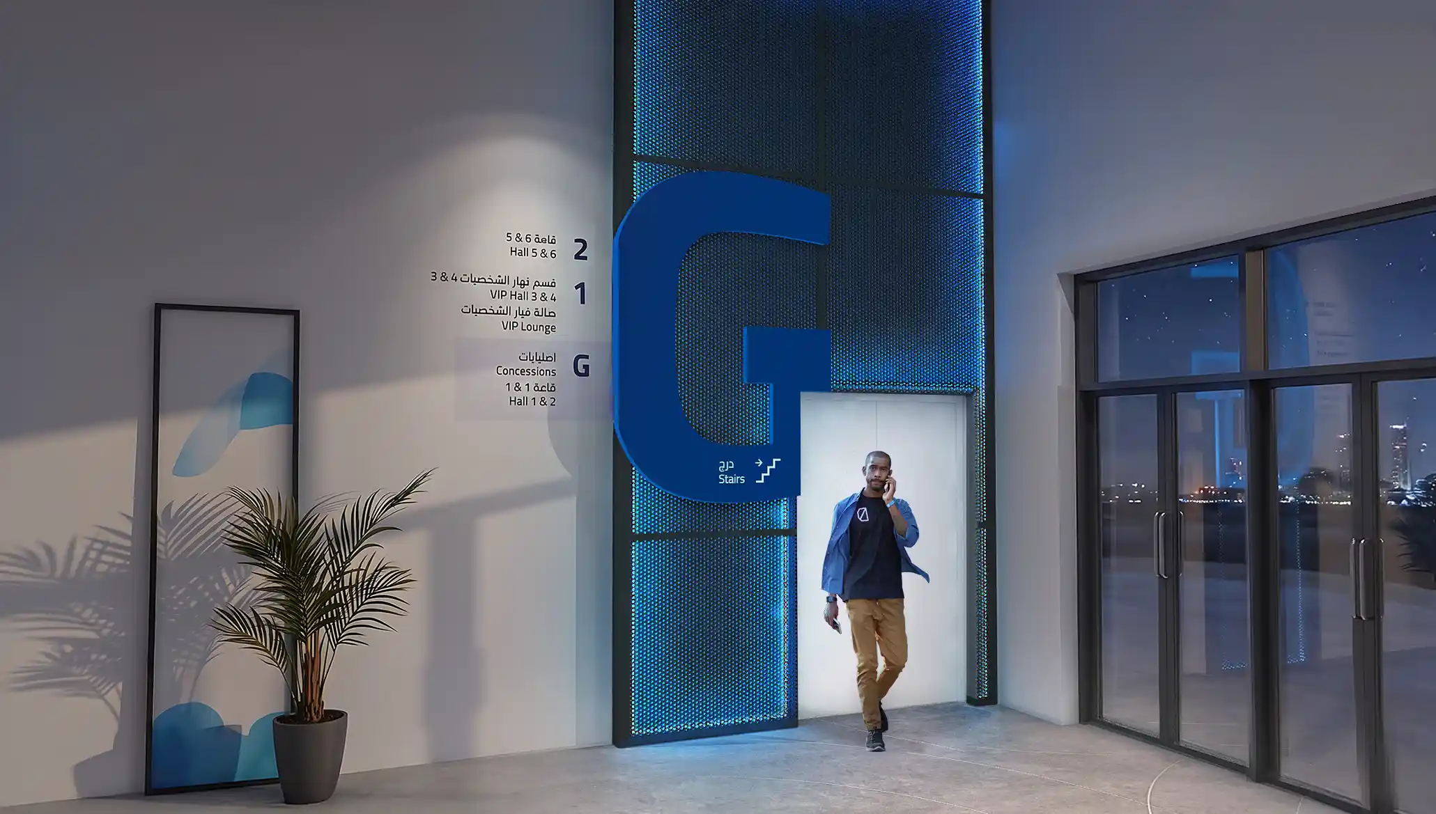 Nighttime view of the stair Identification Signage at Black Box, KSA, designed by LIMAH