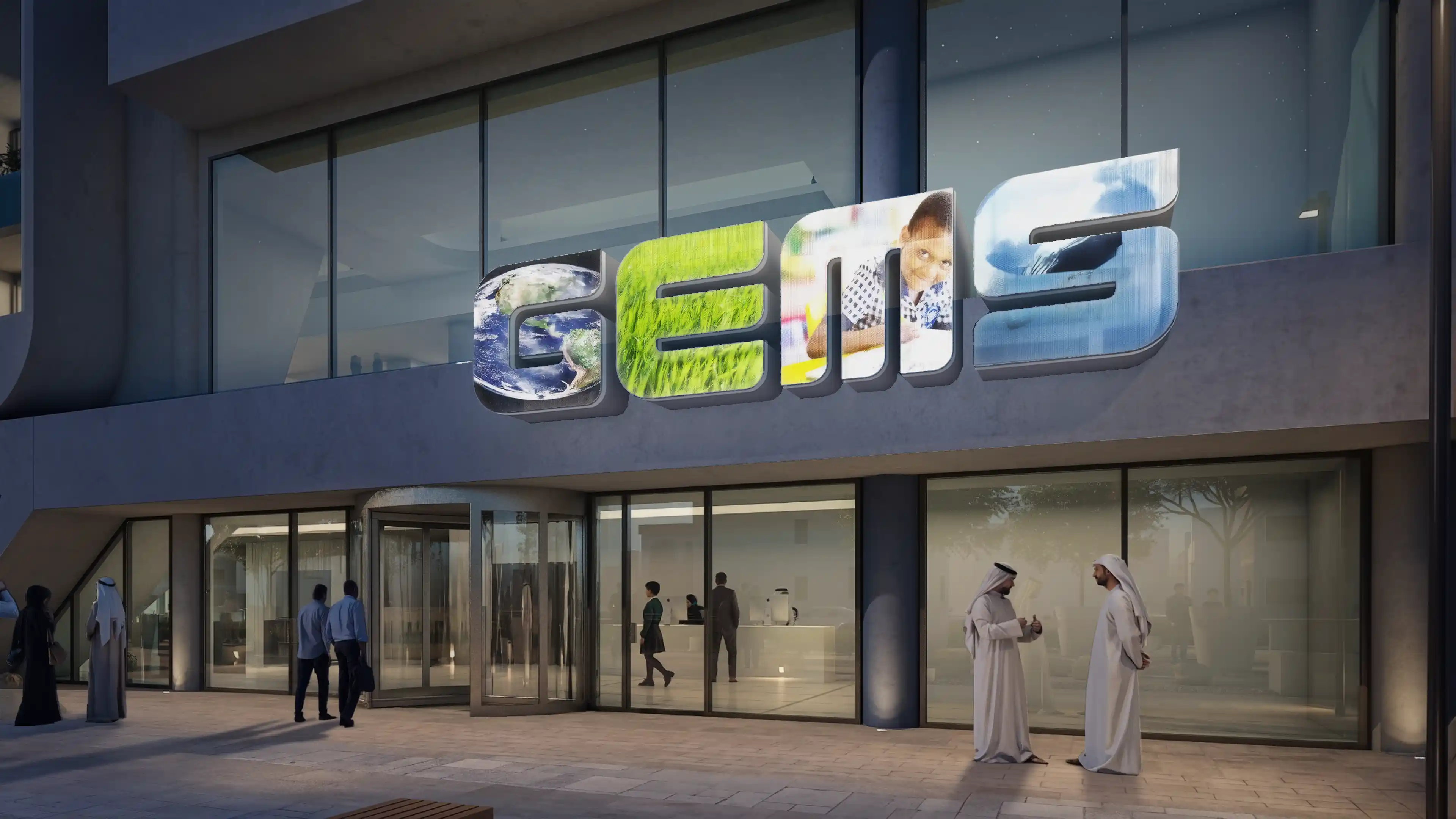 Nighttime view of the main Identification Signage at GEMS Headquarters in Dubai, designed by LIMAH