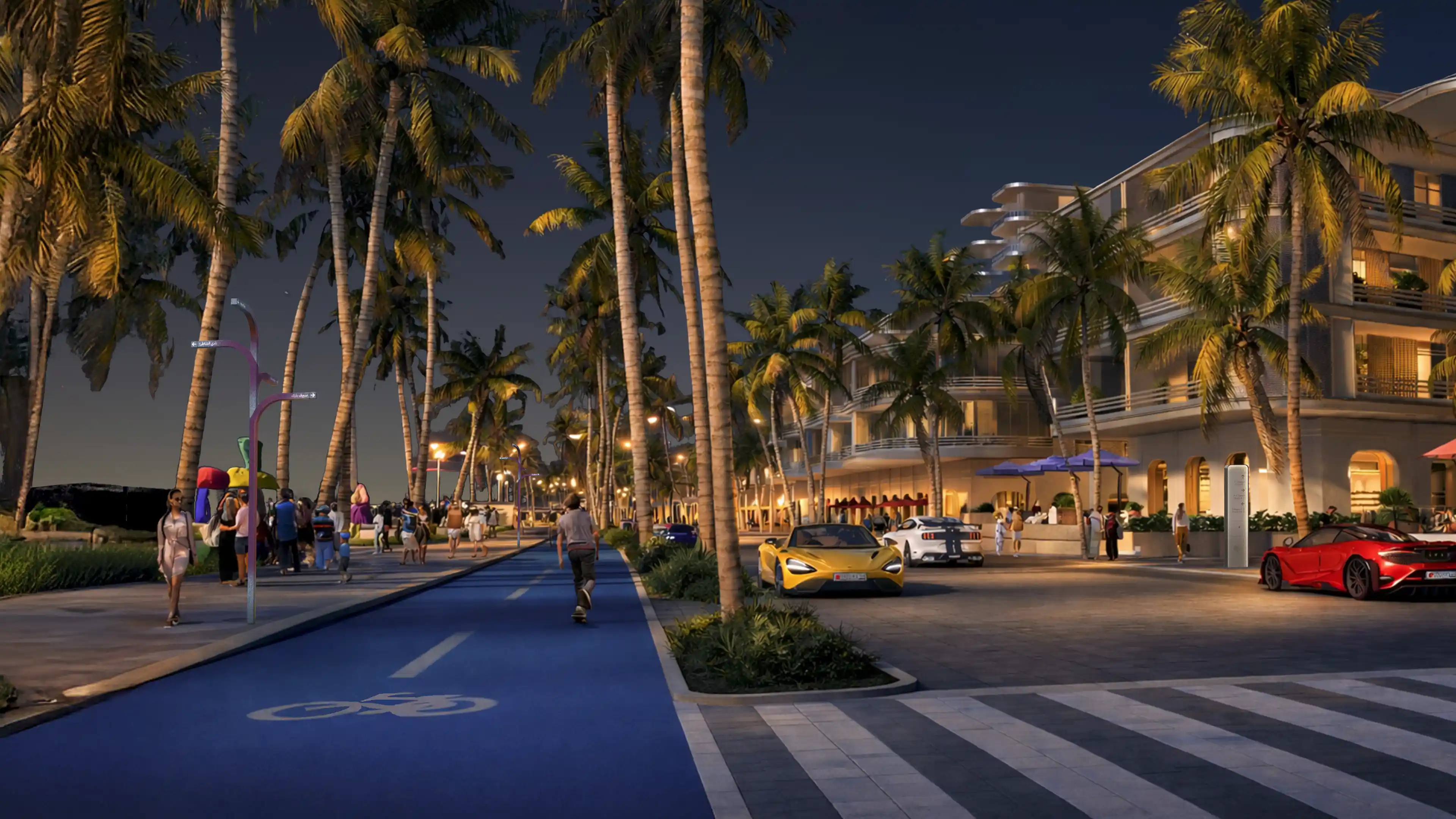 Nighttime view of people navigating Ocean Drive at Bilaj Al Jazayer using LIMAH's integrated wayfinding and signage system