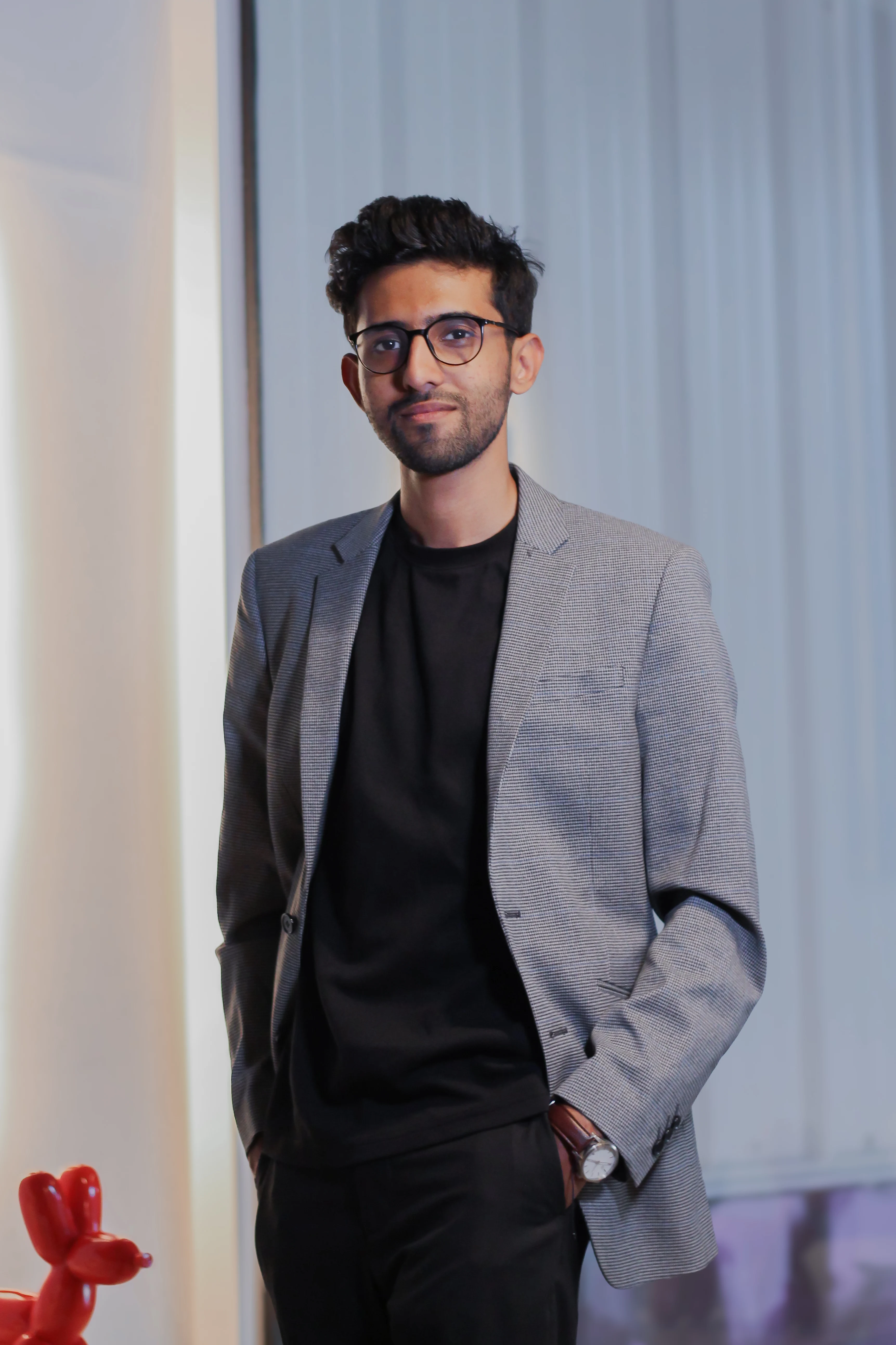 Gokul Nair, Senior Experiential and Wayfinding Designer at LIMAH, in a full length portrait