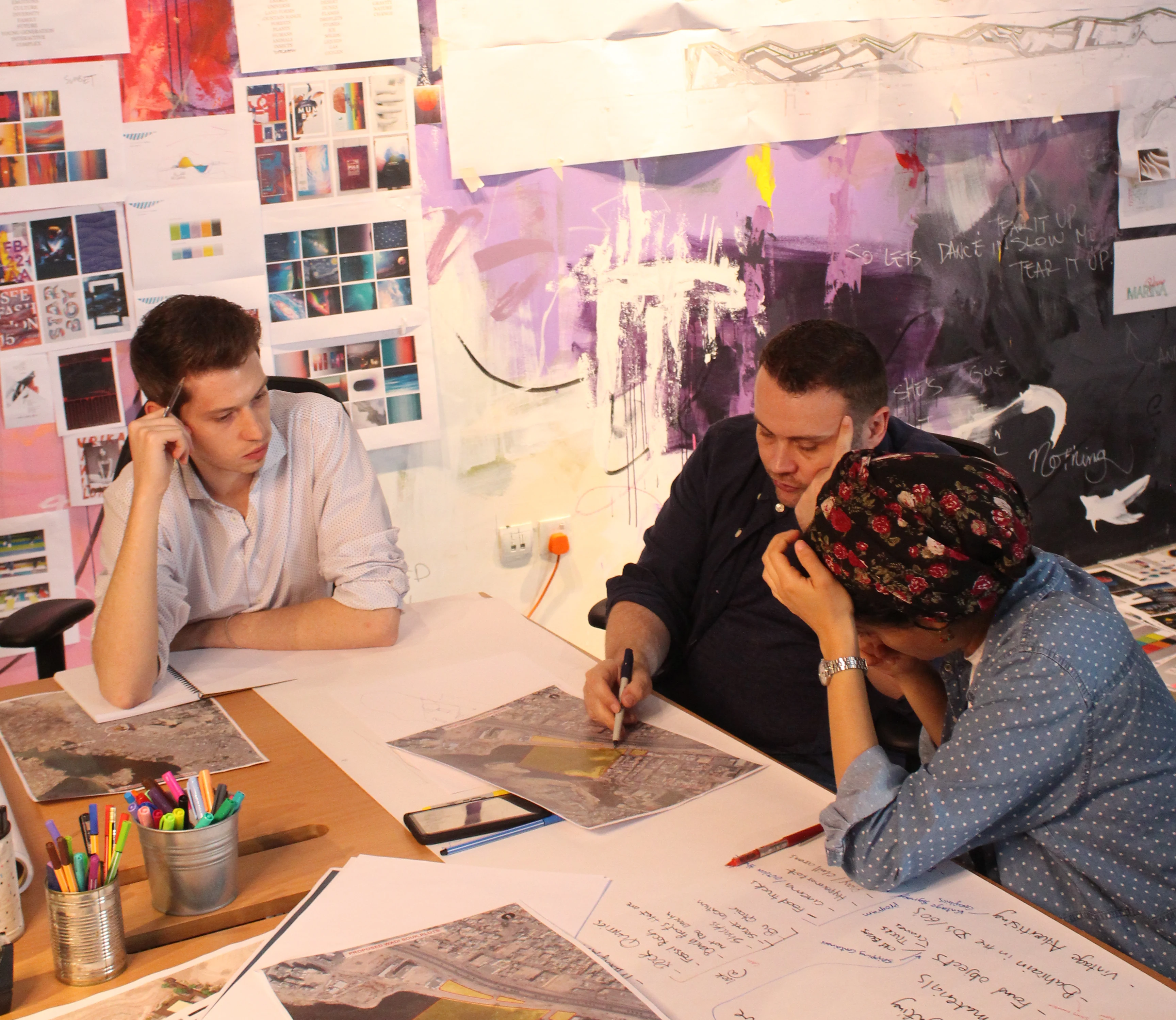 Jason Lewis, LIMAH founder, strategizing with the design team on initial wayfinding strategy