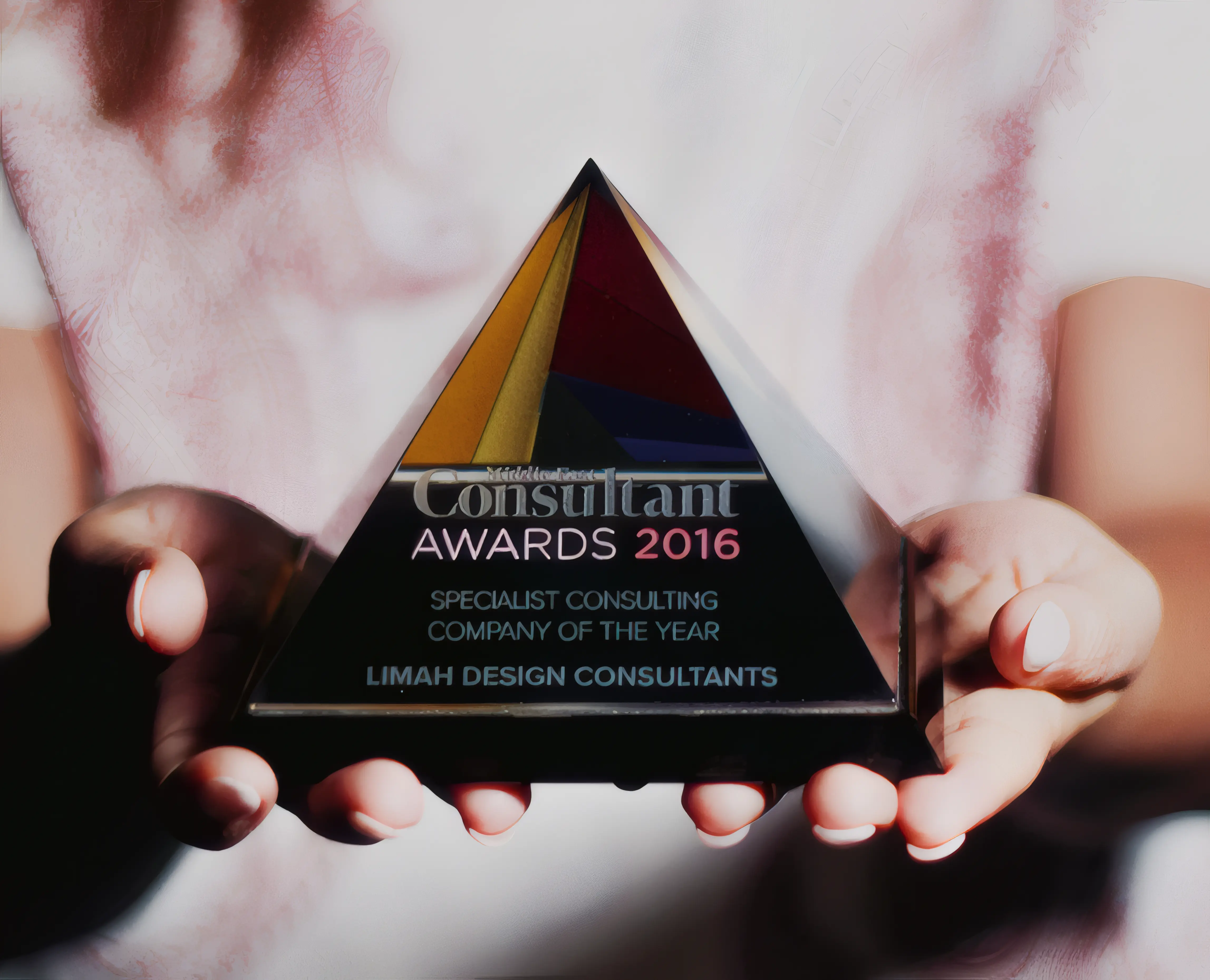 LIMAH designer holding the Middle East Consultant award, for Specialist Consultant Company of the Year, 2016