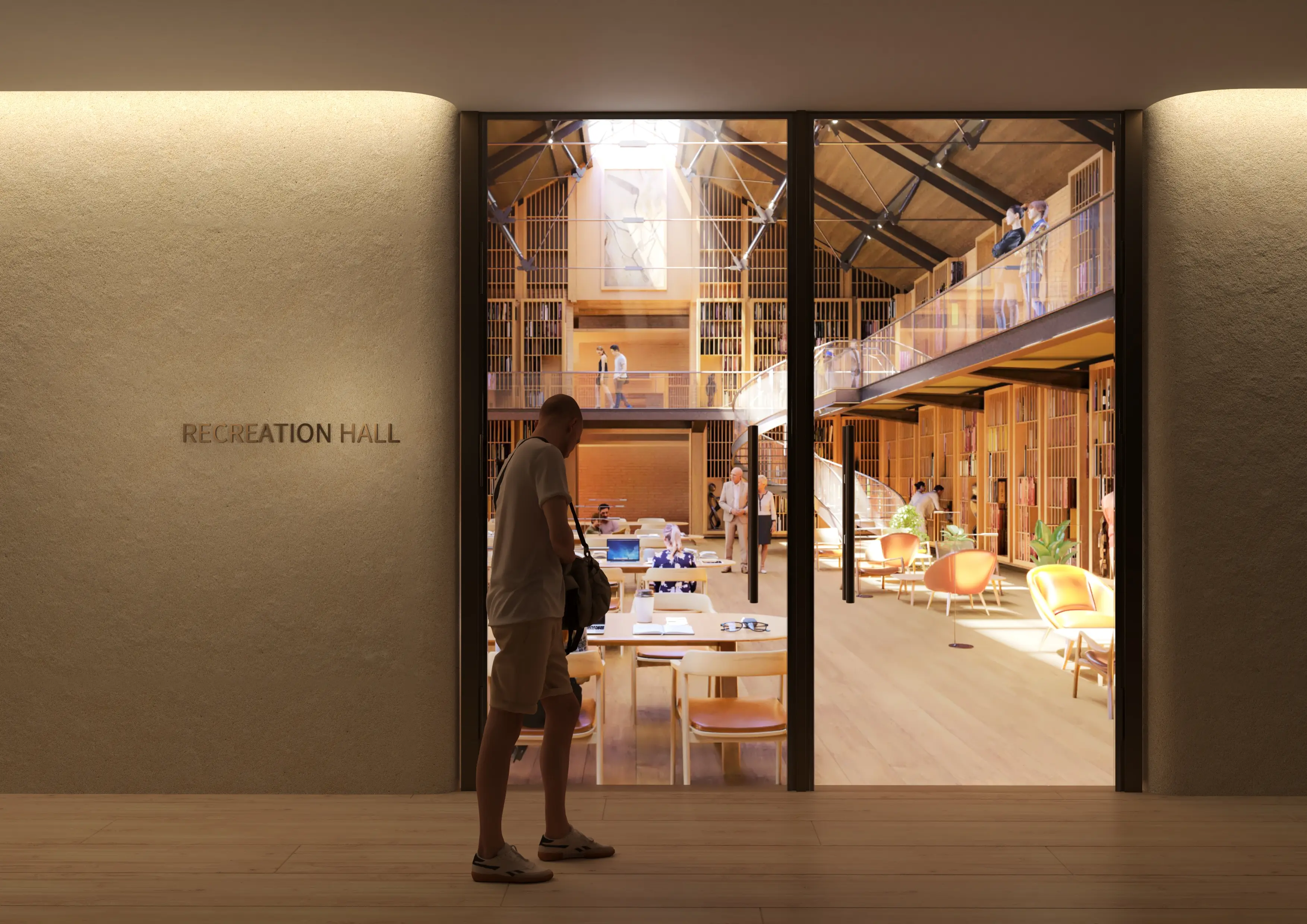 Visitor entering the Recreation Hall at the Ellison Institute of Technology, guided by area identification signage.