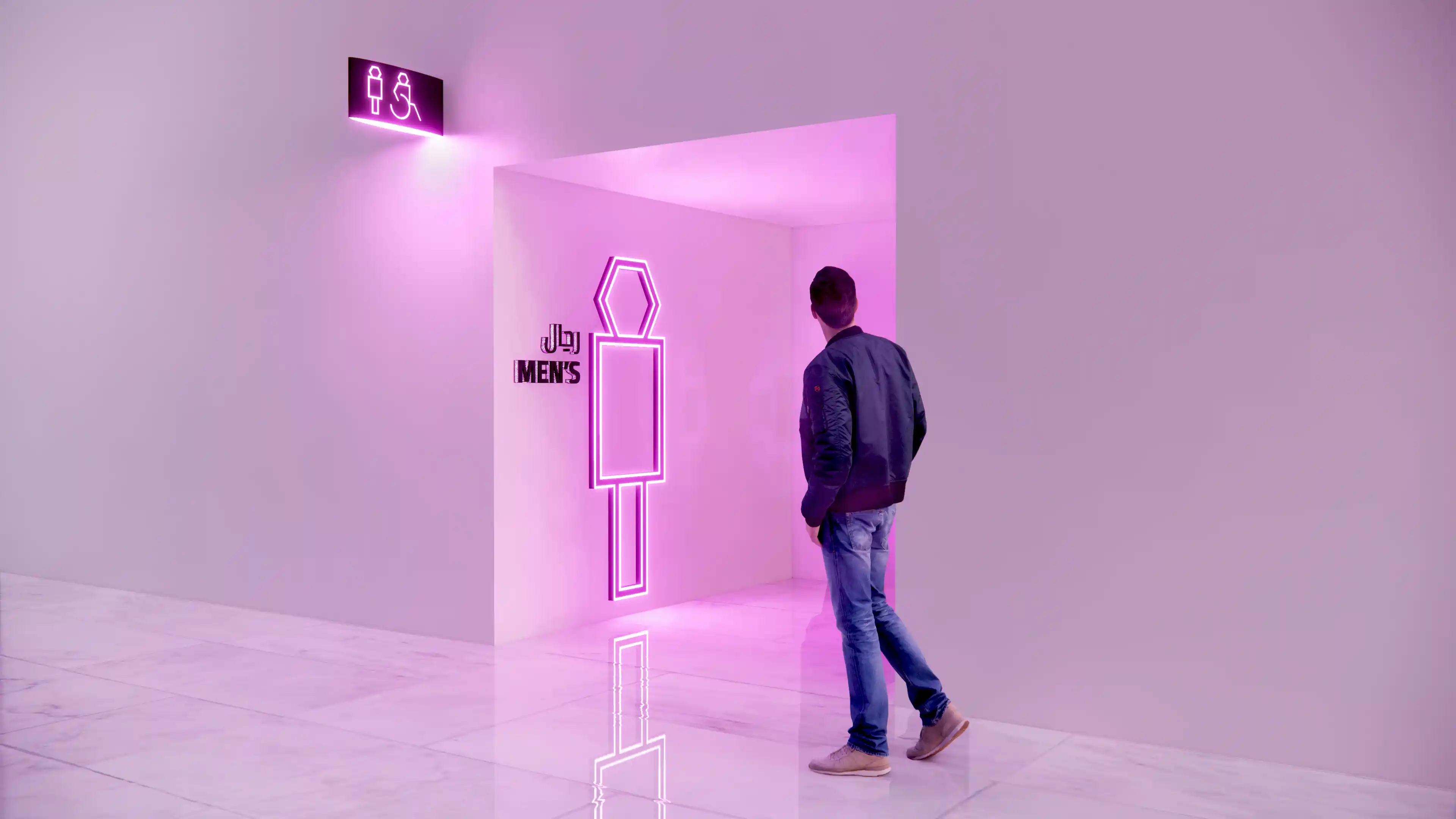 Man walking past men's washroom identification signage at Exit 10.