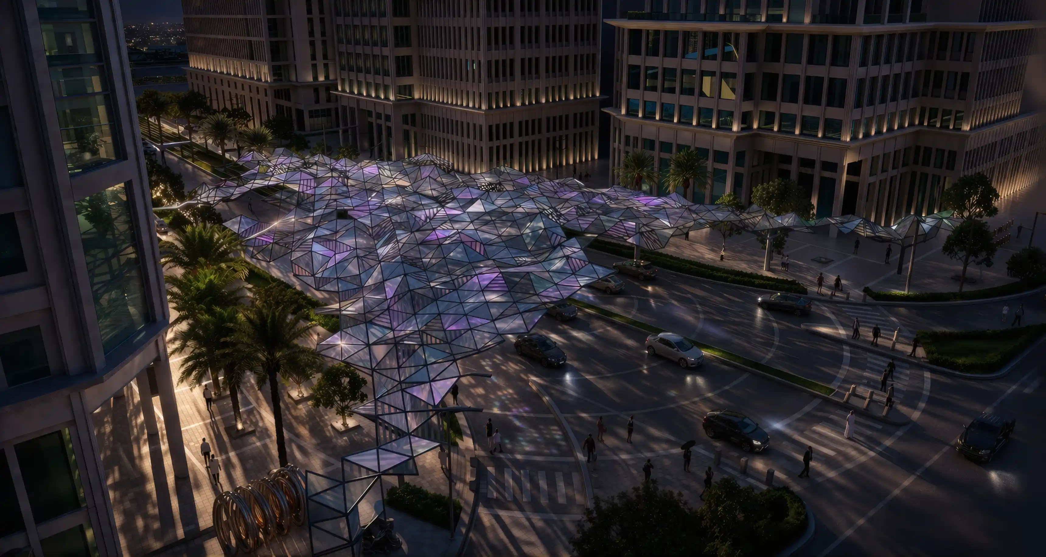 Night-time aerial view of the illuminated arrival gateway at Tilal Al Irfan, highlighting its architectural form and experiential design.
