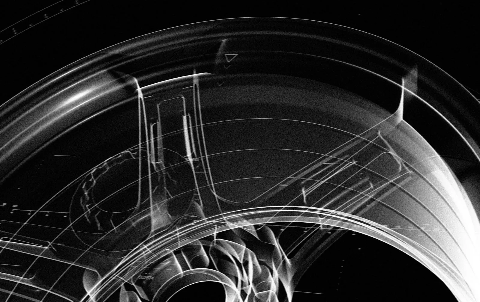 X-ray view of a mechanical component showing intricate internal structures and circular parts.