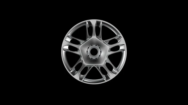 Silver car wheel rim with a modern multi-spoke design on a black background.