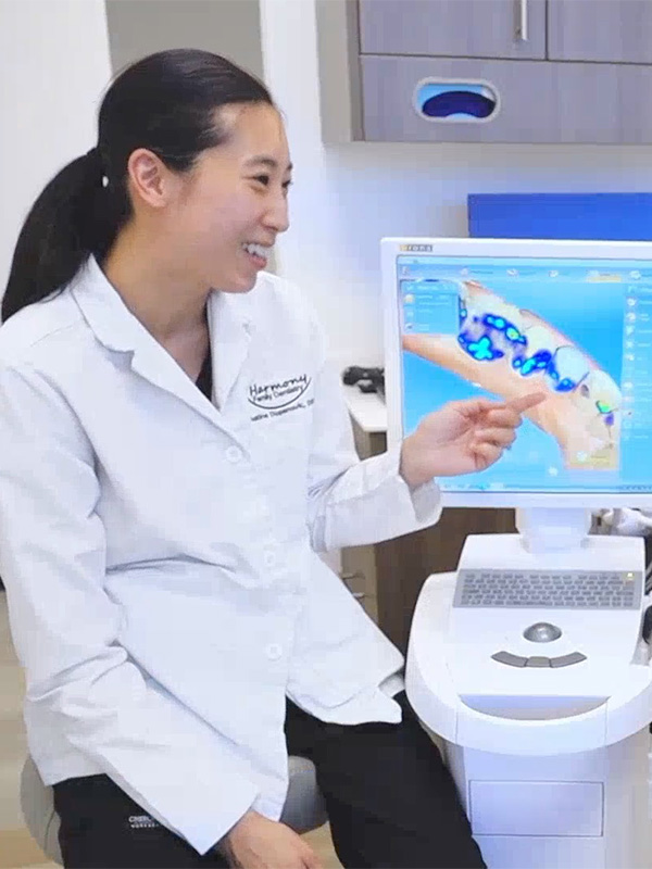 Carson city dentist showing dental scans to a patient