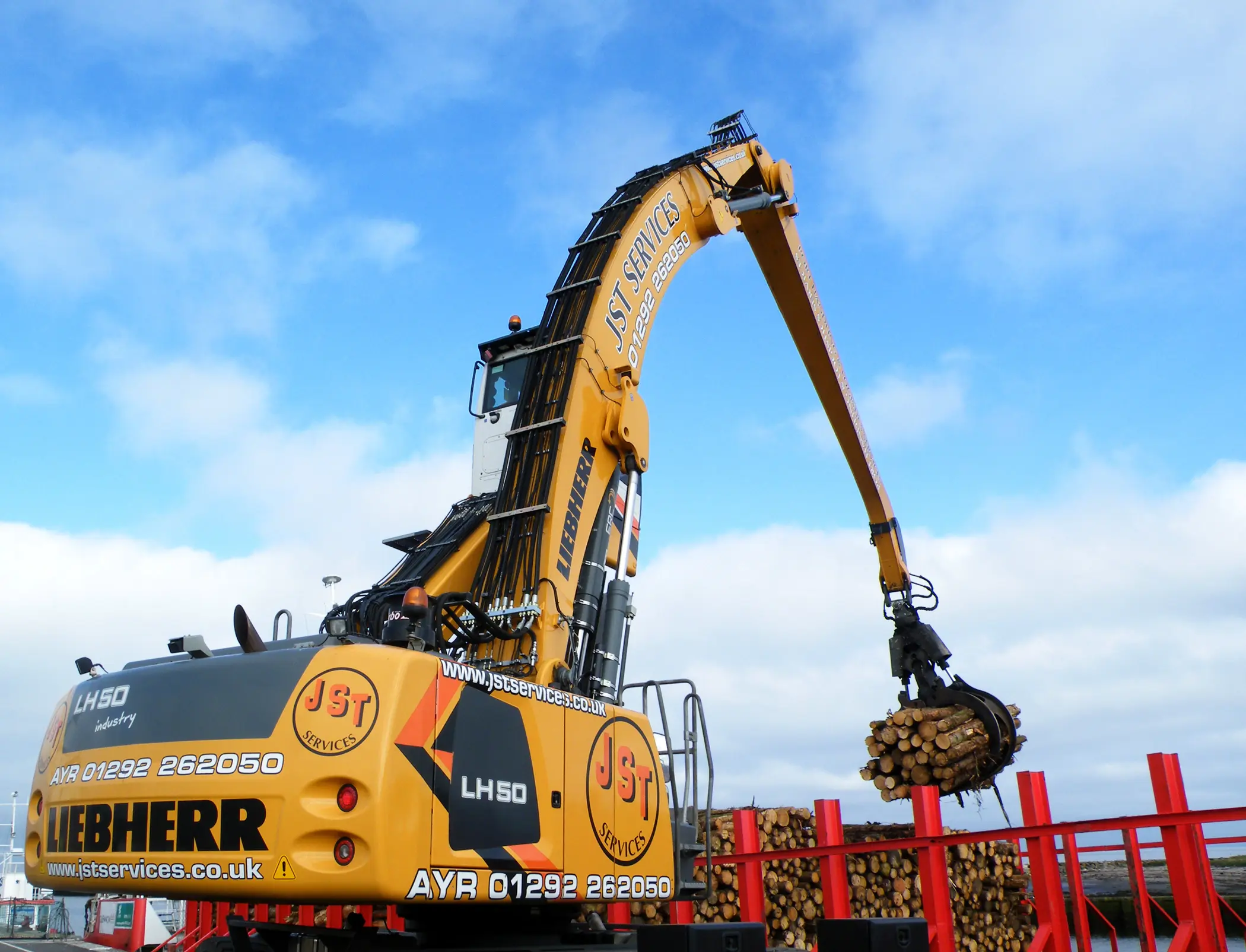 A yellow machine with the words "JTJ" on the side.