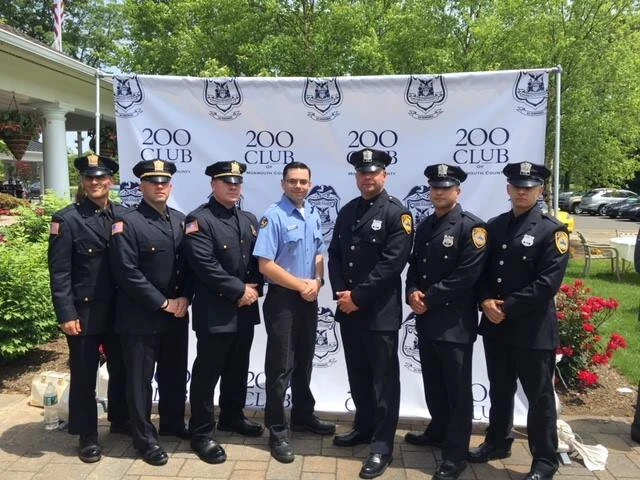 7 Aberdeen officers standing at a charity event