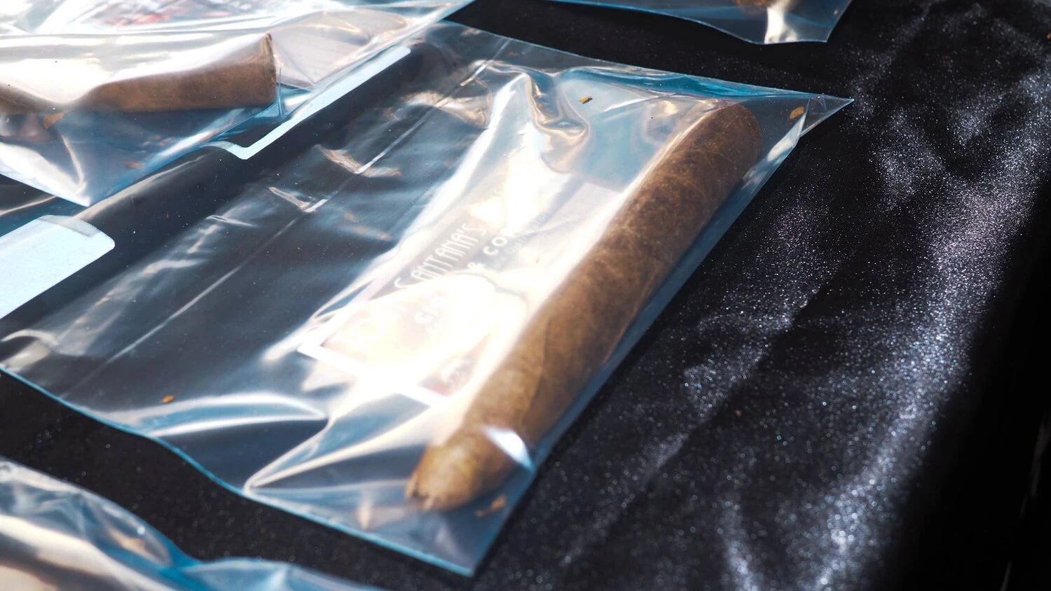 a cigar inside a clear pouch