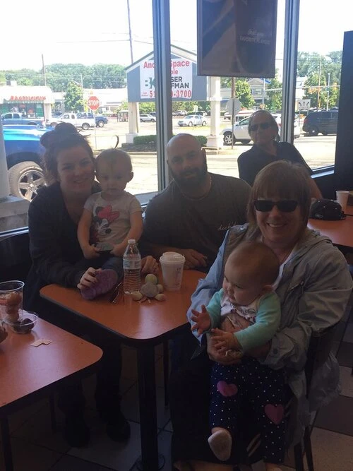 family enjoying coffee