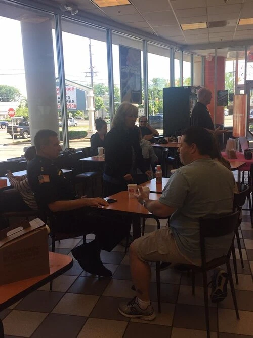 aberdeen police officers having coffee with community members