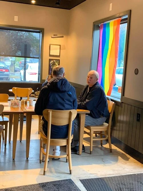two people sitting at a table