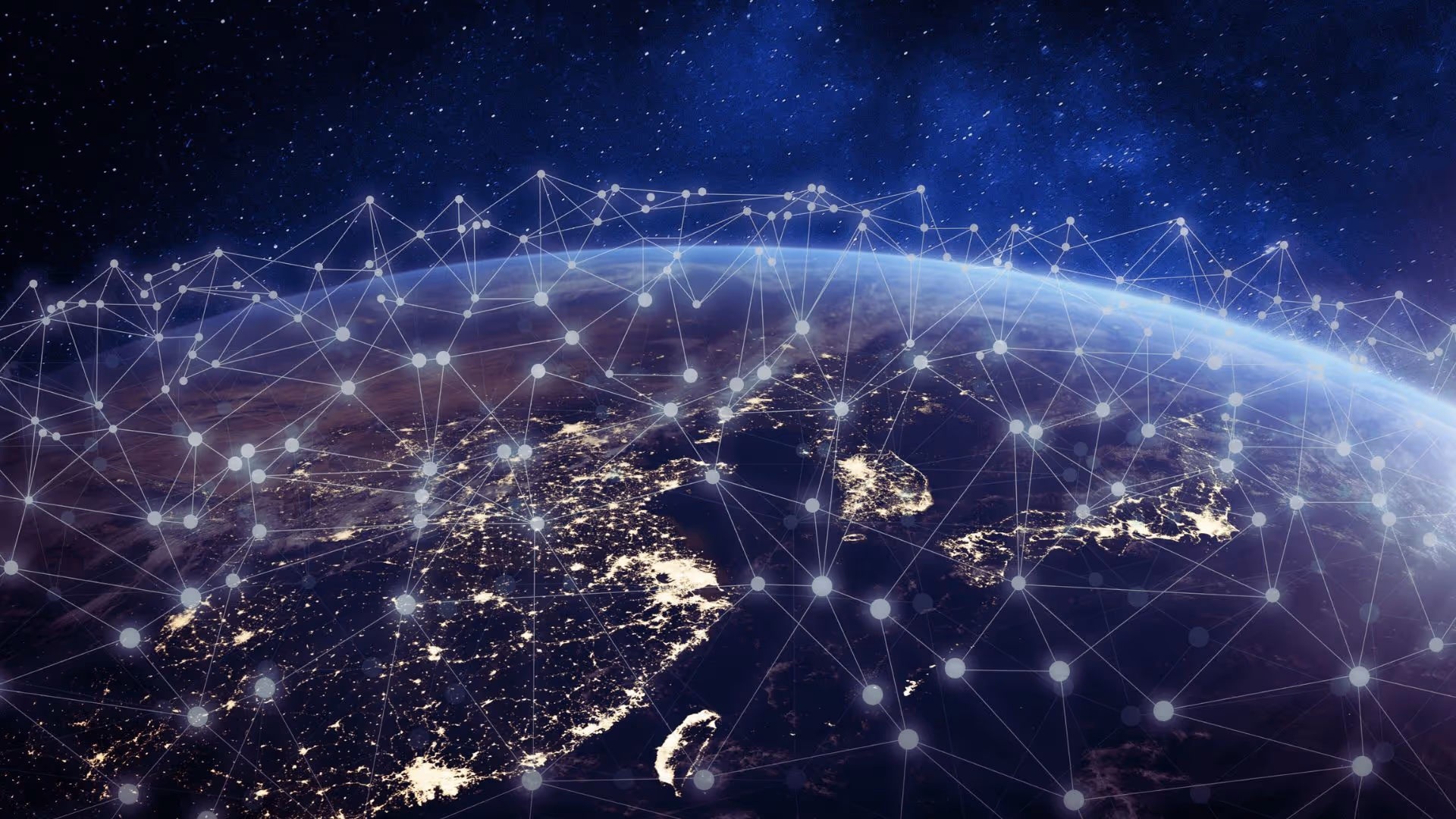 View of Earth from space at night showing illuminated cities and a digital network of connected glowing nodes.