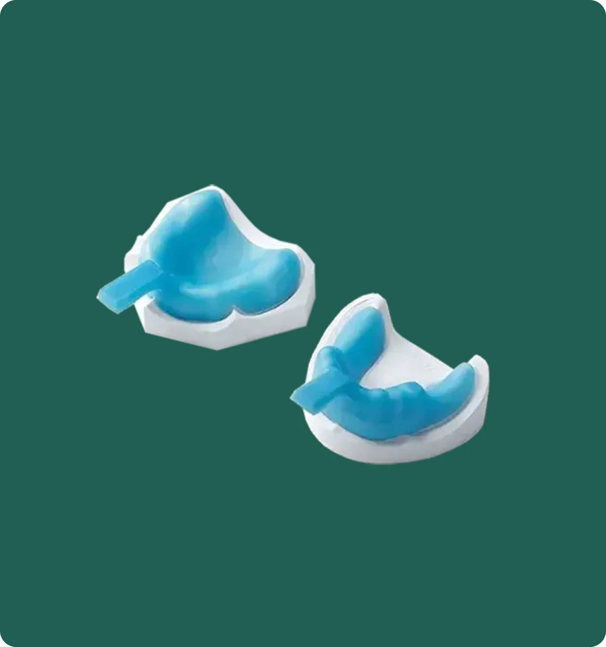 Custom VLC light-cured impression tray shown on a dental model, used for crown and bridge impressions.