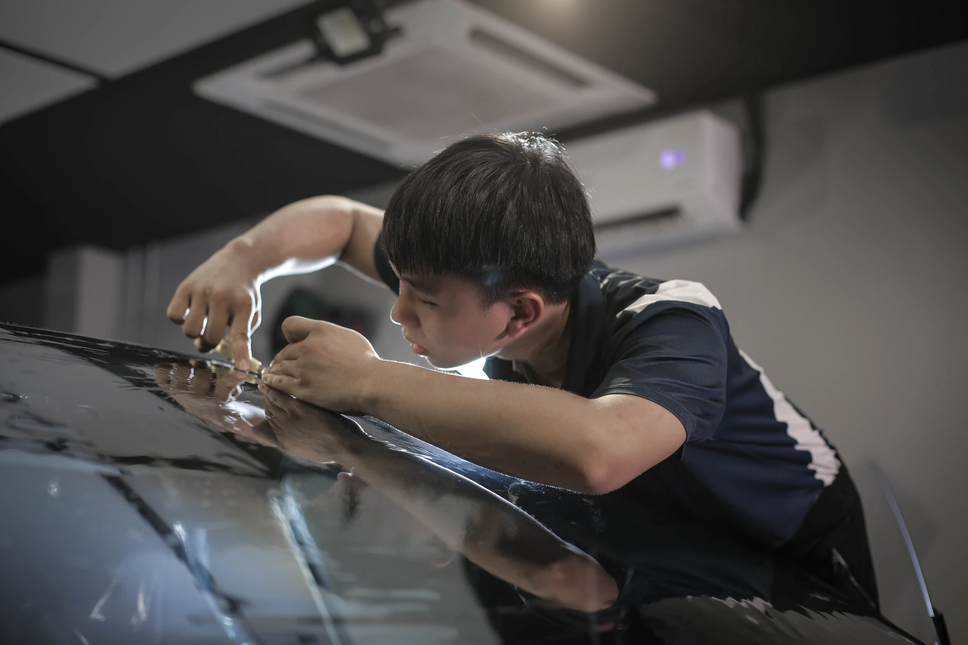 Installation of window tint by 3M certified installer.