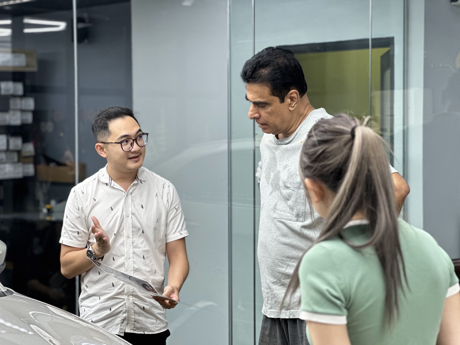 An adviser walking a customer through service options, the conversation where how much PPF coverage you need gets decided.